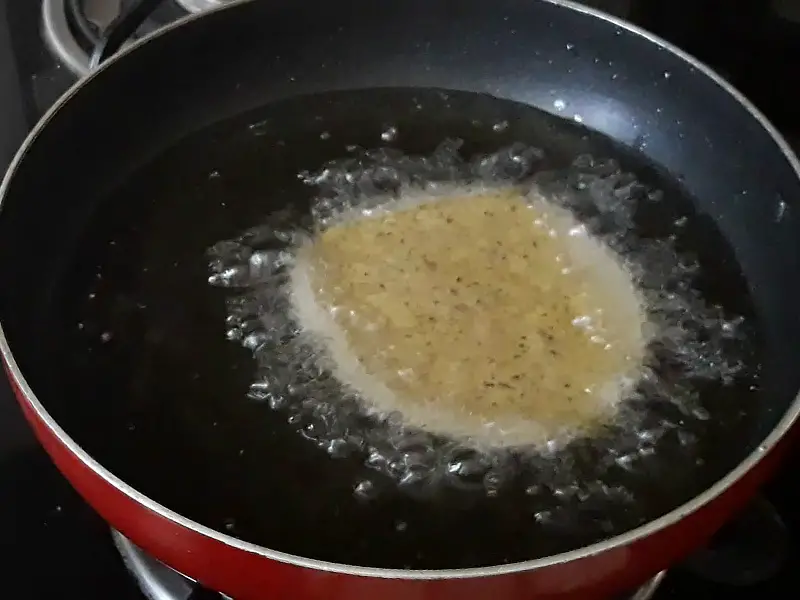 slid puri one by one in oil