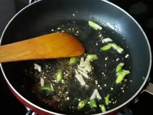 green chilies and ginger for bread upma
