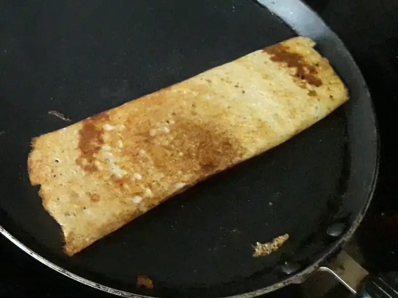 dosa is crispy and brown