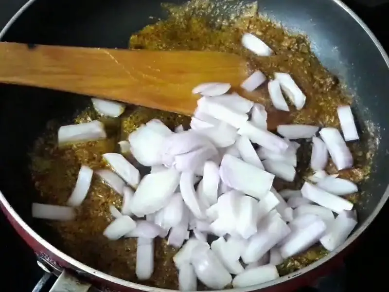 chopped onion in oil for frying for potato masala
