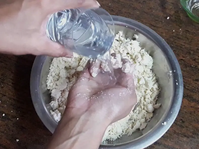 add water in mixture and knead it