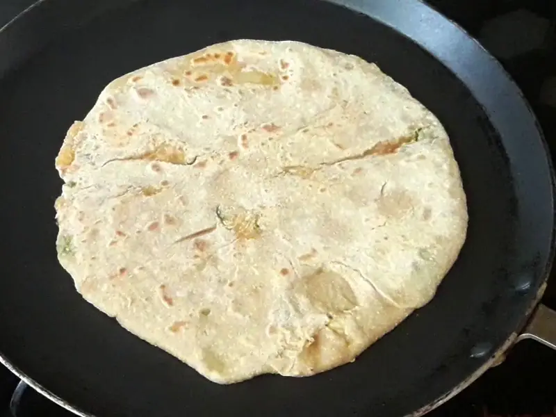 paratha little bit cooked from one side