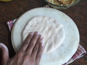 dough spread with the help of fingers