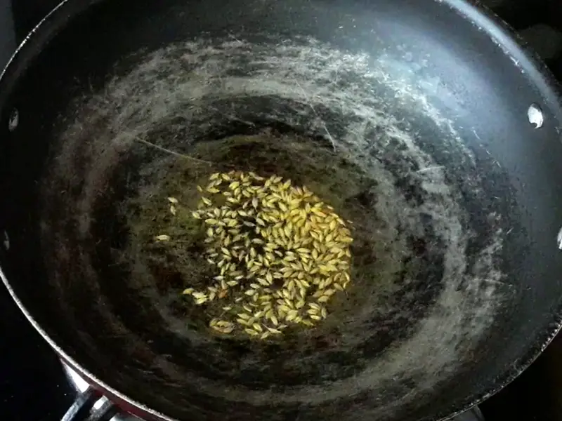 fry jeera in oil for samosa stuffing