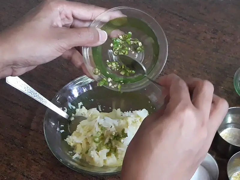 green chilies in grated potatoes