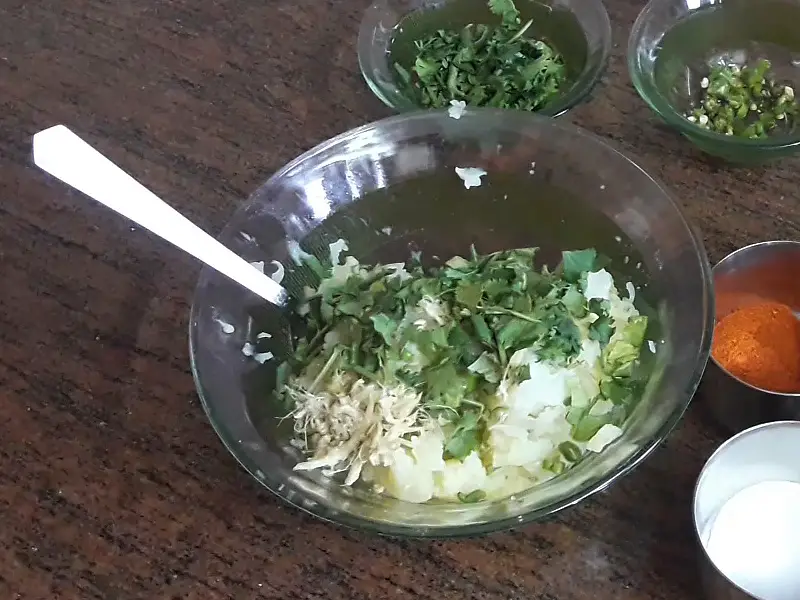 coriander in the grated potatoes