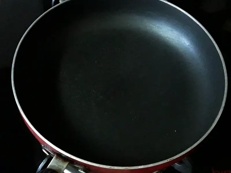 head the pan on stove to cook